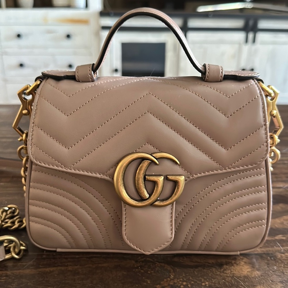 Authentic Gucci handbag. Slightly used in mint condition